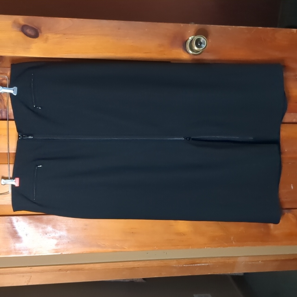 PENNINGTON'S* flat front 2 way zip front elastic back straight skirt poly spande